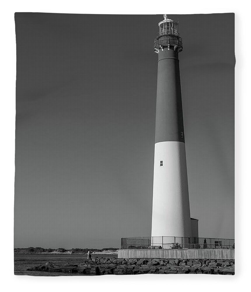 Barnegat Lighthouse And Inlet New Jersey Black And White Fleece Blanket featuring the photograph Barnegat Lighthouse and Inlet New Jersey Black and White by Terry DeLuco
