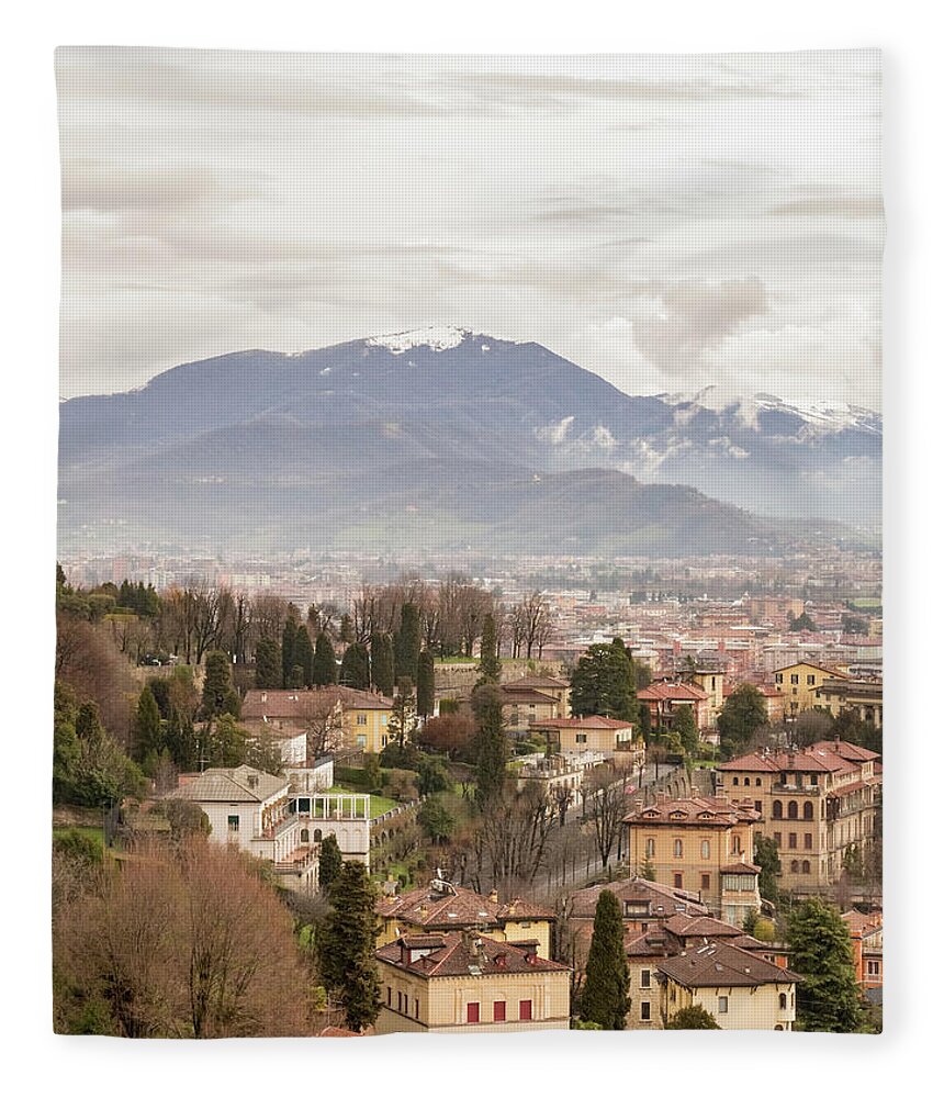 Bergamo Fleece Blanket featuring the photograph Bergamo and the Mountains by Pavel Melnikov