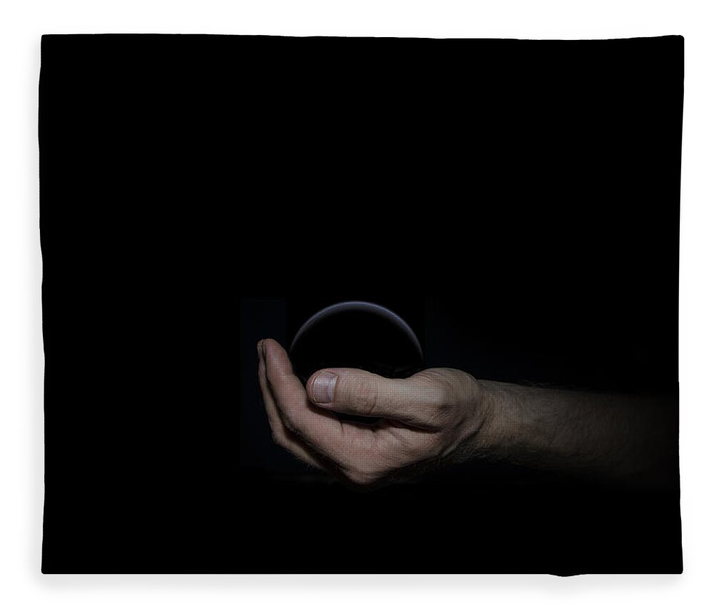 Black Fleece Blanket featuring the digital art Black Sphere in Hand by Pelo Blanco Photo