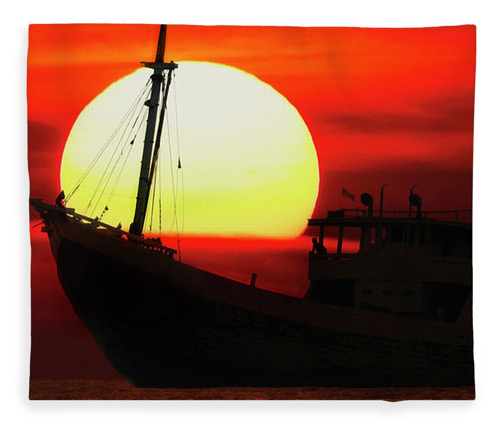Sun Fleece Blanket featuring the photograph Boatman enjoying sunset by Pradeep Raja Prints