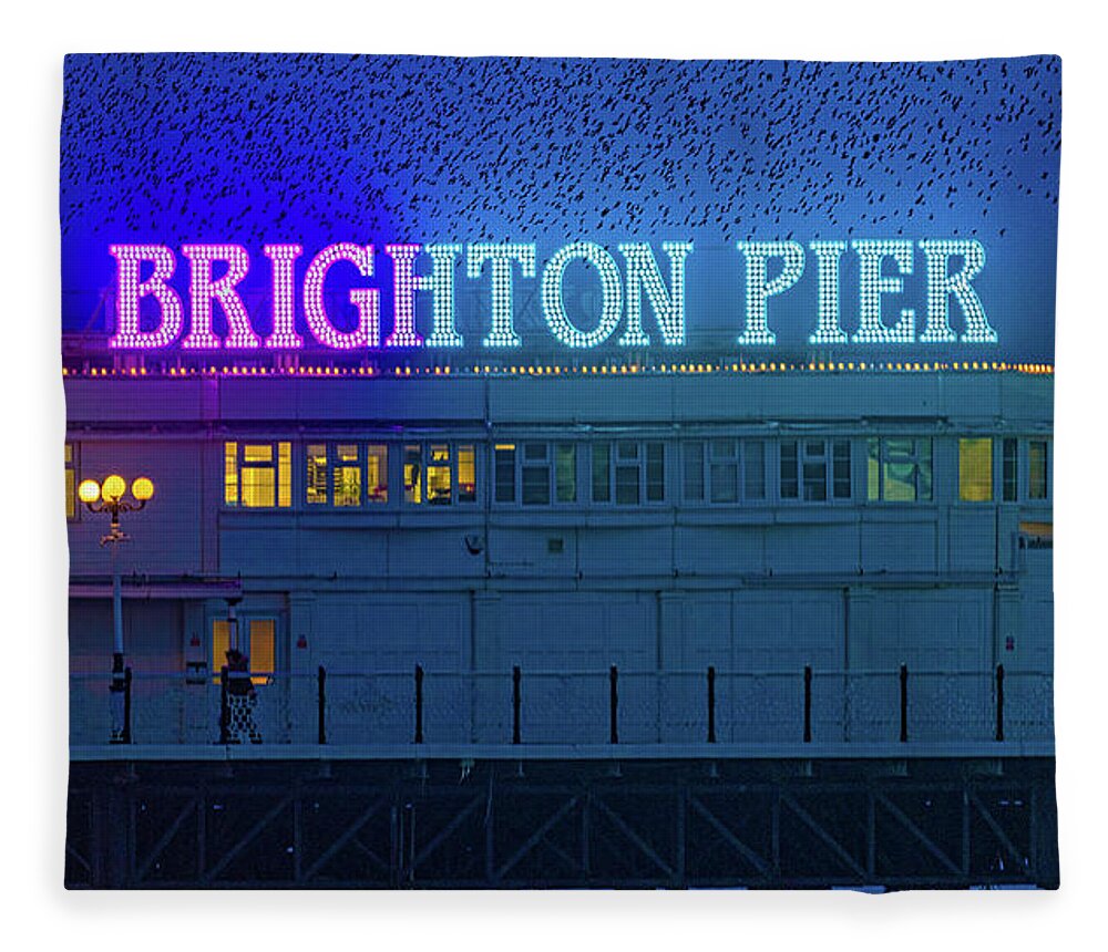 Murmuration Fleece Blanket featuring the photograph Brighton Pier And The Starlings by Chris Lord