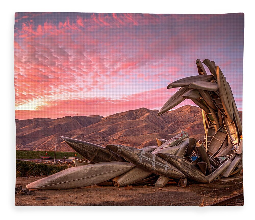 Lewiston Fleece Blanket featuring the photograph Canoe Art Sculpture with Pink Clouds by Brad Stinson