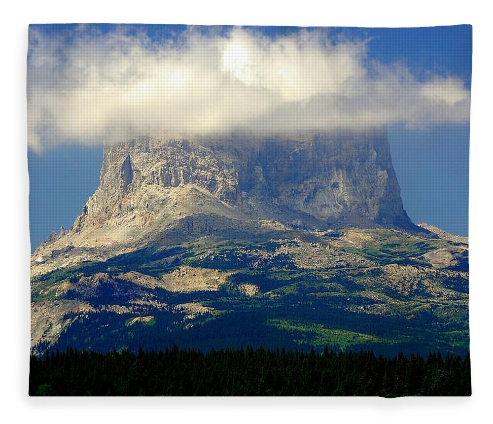 Chief Mountain Fleece Blanket featuring the photograph Chief Mountain, With Its Head in the Clouds by Tracey Vivar