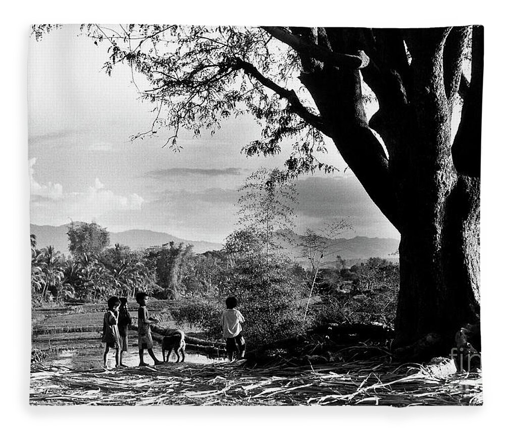 Landscape Fleece Blanket featuring the photograph Children of Central Highland are playing with a dog by Silva Wischeropp