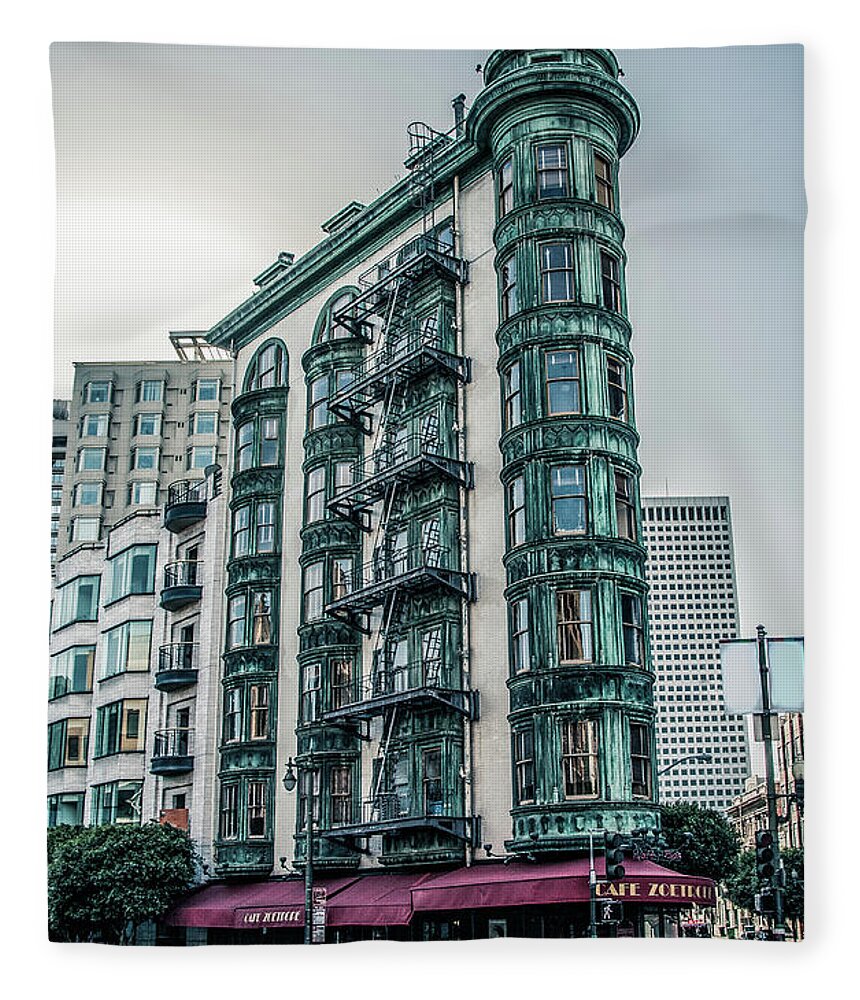 Buildings Fleece Blanket featuring the photograph Dez 2016. San Francisco, USA - Old copper-green Columbus tower o by Amanda Mohler