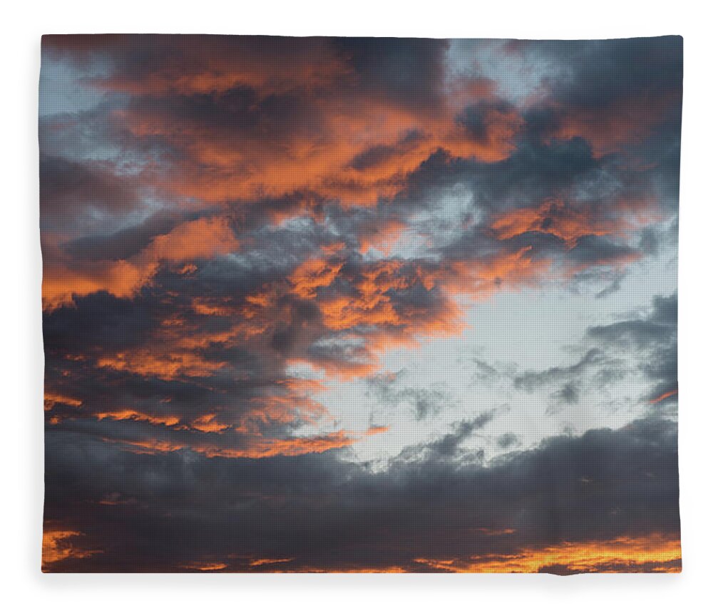 Stormy Clouds Fleece Blanket featuring the photograph Dramatic sunset sky with orange cloud colors by Michalakis Ppalis