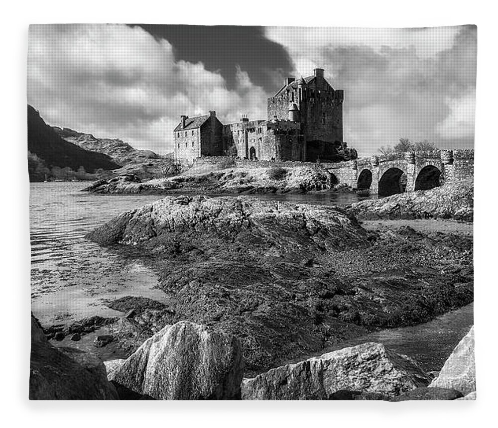 Eilean Donan Fleece Blanket featuring the photograph Eilean Donan Castle in black and white by Holly Ross