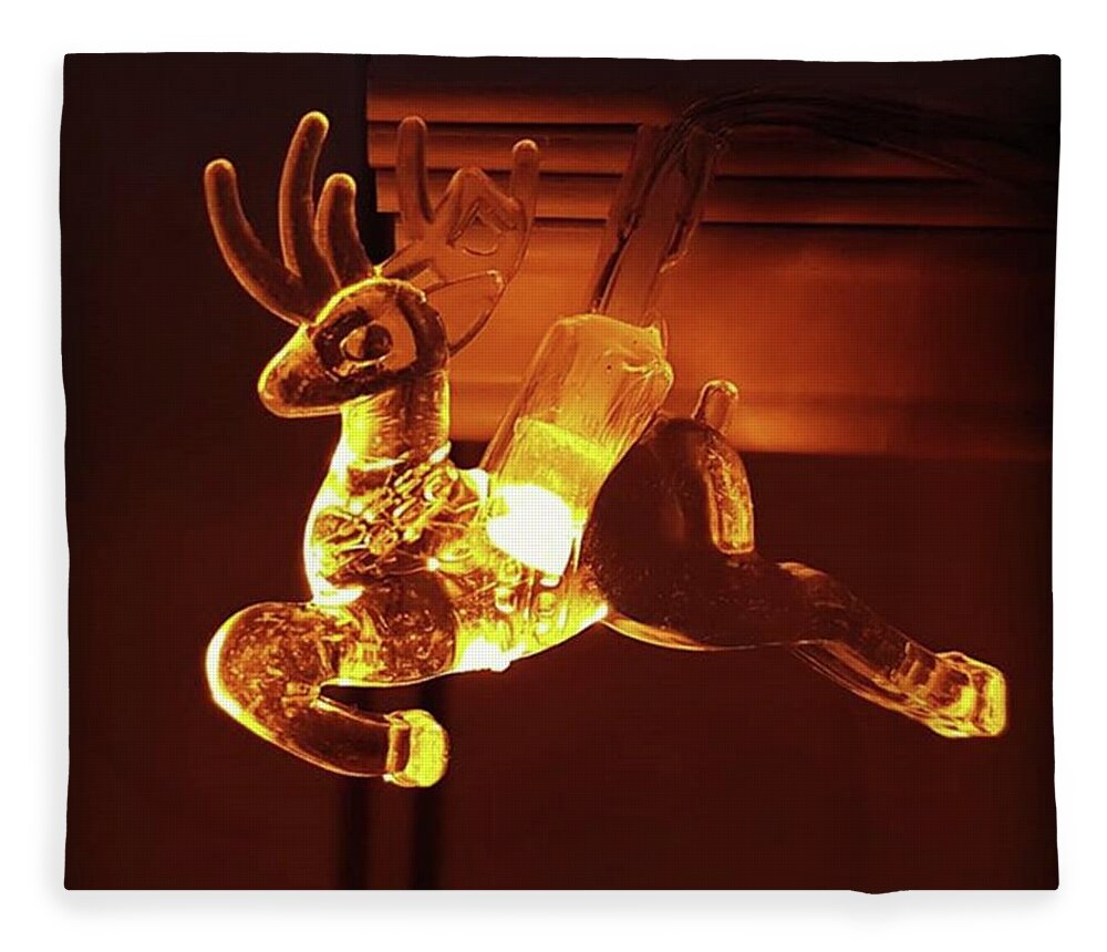 Reindeer Fleece Blanket featuring the photograph Reindeer Glow by Rowena Tutty