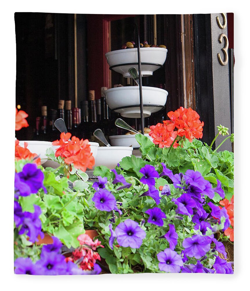 Flowers Fleece Blanket featuring the photograph Flowered store front by Jason Hughes