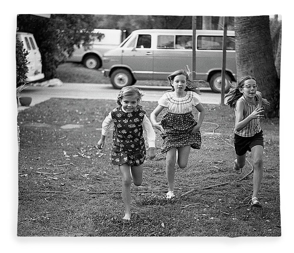 Racing Fleece Blanket featuring the photograph Four Girls Racing, 1972 by Jeremy Butler