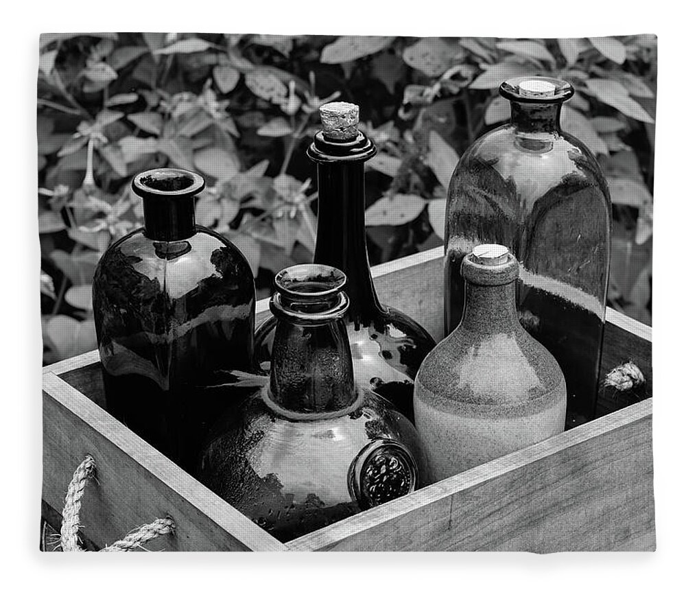 Antique Fleece Blanket featuring the photograph Glass Bottles in the Garden by Nicole Lloyd