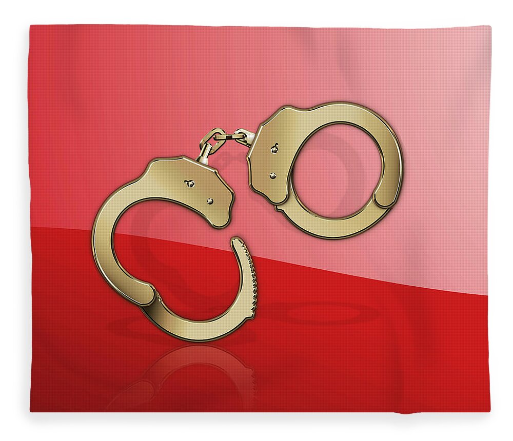 Tools Of The Trade By Serge Averbukh Fleece Blanket featuring the photograph Gold Handcuffs On Red by Serge Averbukh