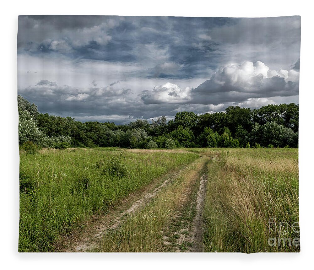 Acre Fleece Blanket featuring the photograph Gravel road through scenic landscape in a national park in Austria by Andreas Berthold