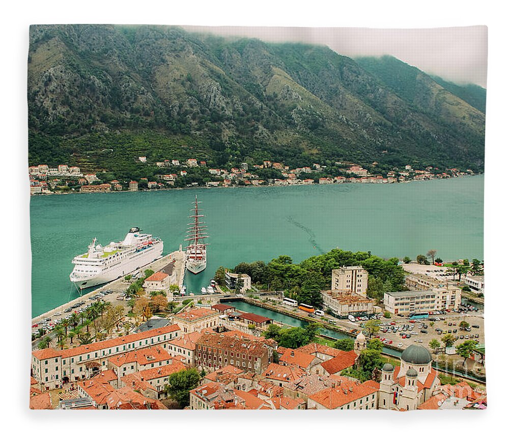Kotor Fleece Blanket featuring the photograph Gulf of Kotor with cruise liner by Iryna Liveoak