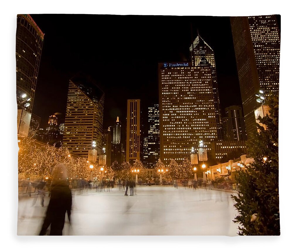 Ice Rink Fleece Blanket featuring the photograph Ice Skaters and Chicago Skyline by Sven Brogren