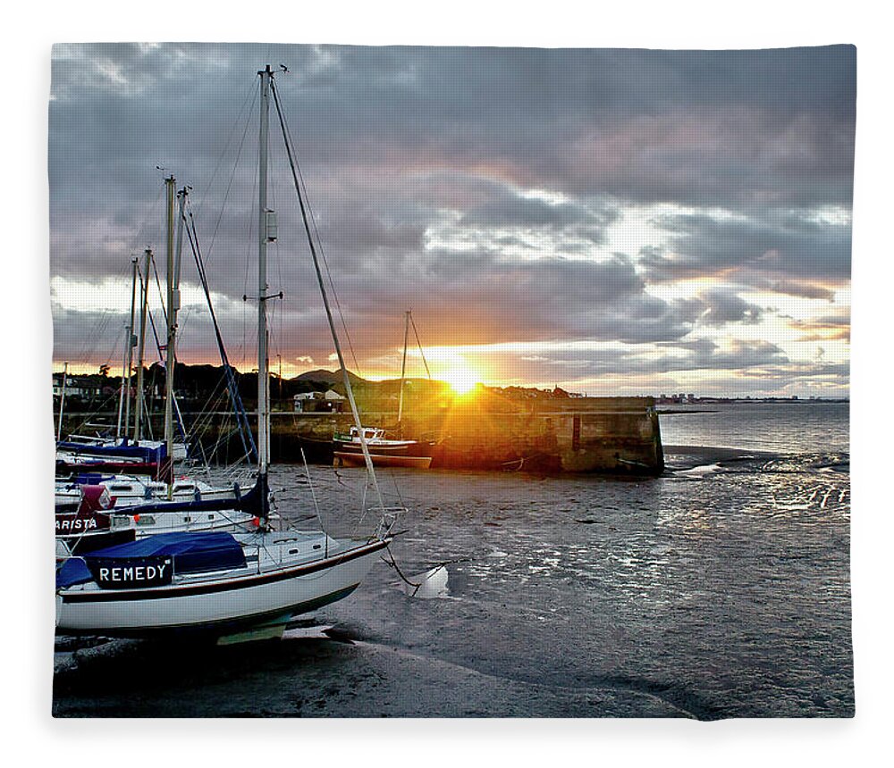 Sunset Fleece Blanket featuring the photograph In the rays of the setting sun. by Elena Perelman