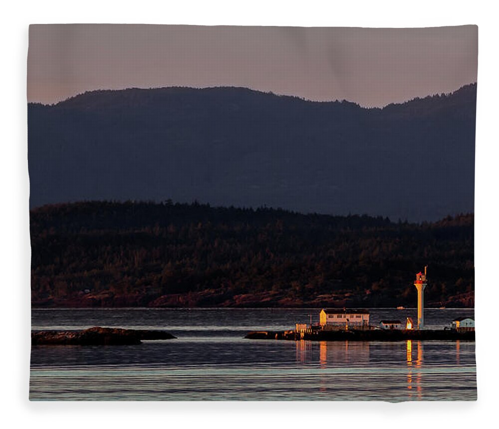 Reflection Fleece Blanket featuring the photograph Isolated Lighthouse by Ed Clark