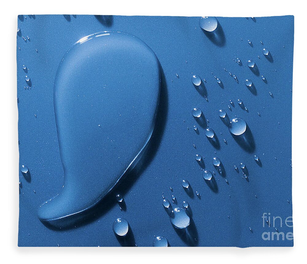 Water Fleece Blanket featuring the photograph Large and small water droplets viewed from above by Simon Bratt
