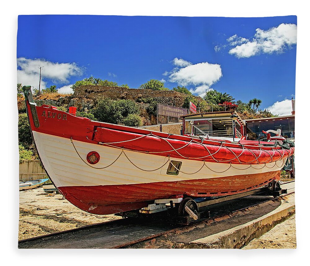 Lifeboat Fleece Blanket featuring the photograph Lifeboat in Alvor Portugal by Jeff Townsend