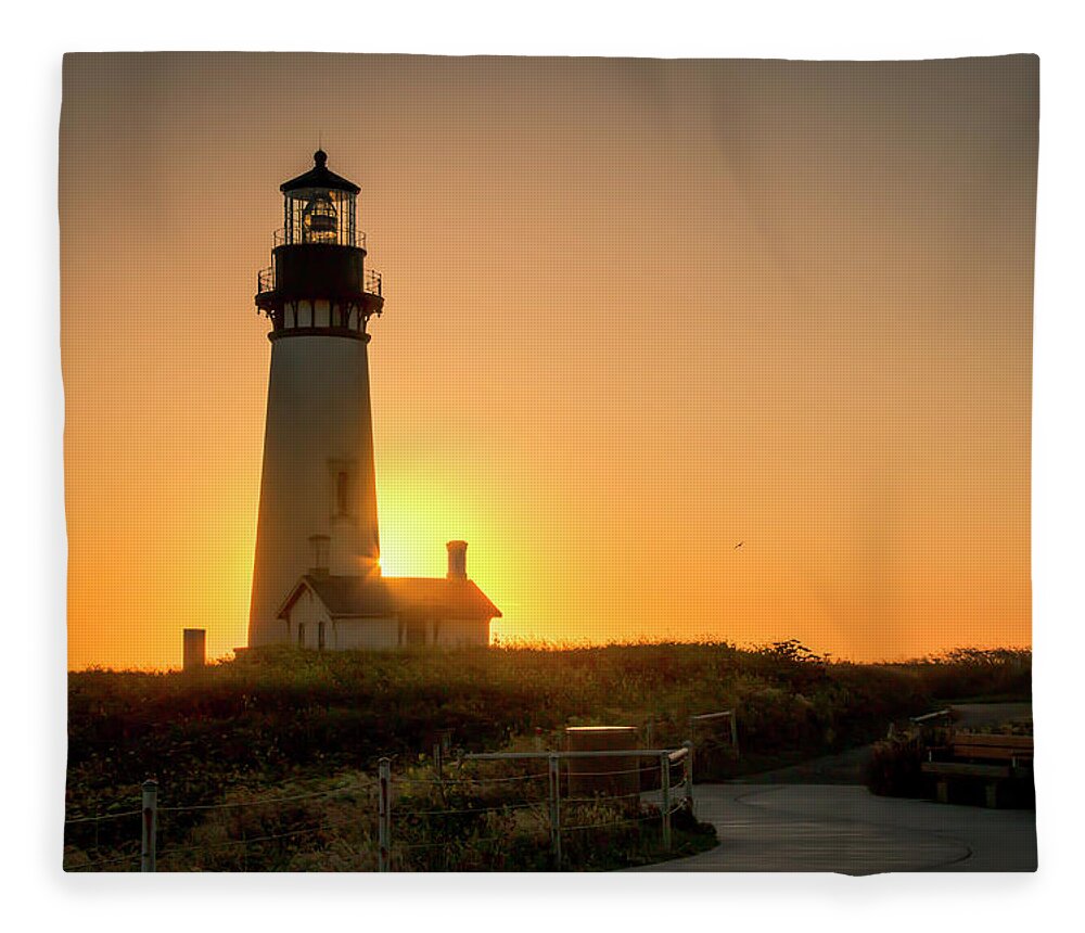 Yaquina Head Fleece Blanket featuring the photograph Lighthouse Sunset by Kristina Rinell
