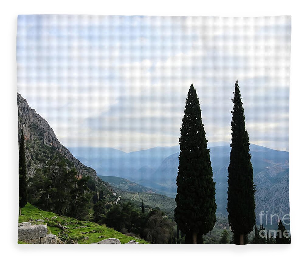 Cypress Fleece Blanket featuring the photograph Looking out over Valley and Mountains from Ruins at Delphi Greece by Susan Vineyard