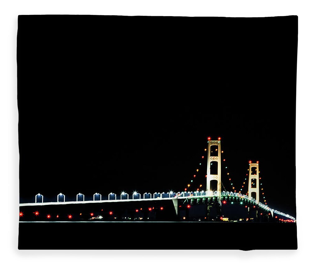 Michigan Fleece Blanket featuring the photograph Mackinaw Bridge 60th Anniversary by Joe Holley