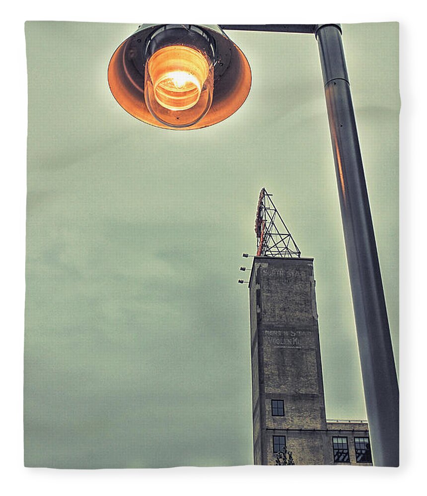 Minneapolis Fleece Blanket featuring the photograph Mill District Lamplight by Becqi Sherman