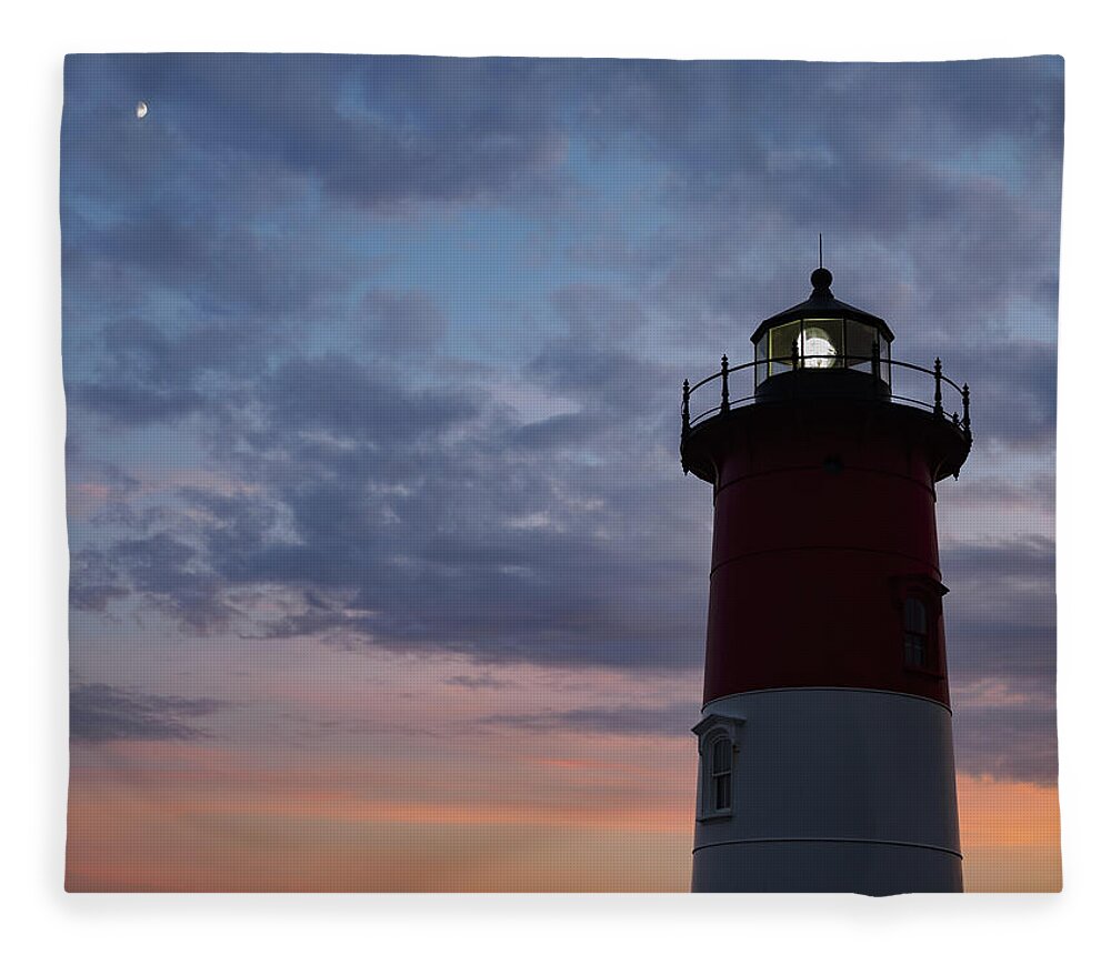 Blue Hour Fleece Blanket featuring the photograph Nauset Light lighthouse at sunset by Marianne Campolongo
