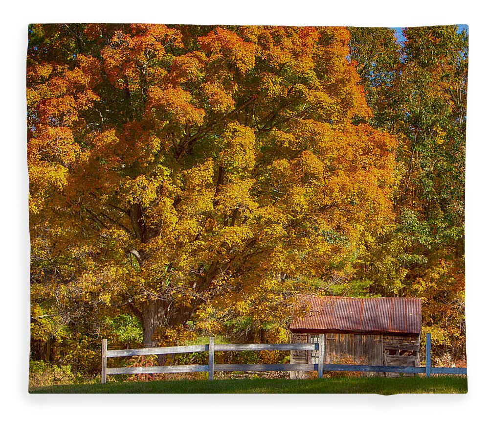 Autumn Fleece Blanket featuring the photograph New hampshire barn under fall foliage by Jeff Folger