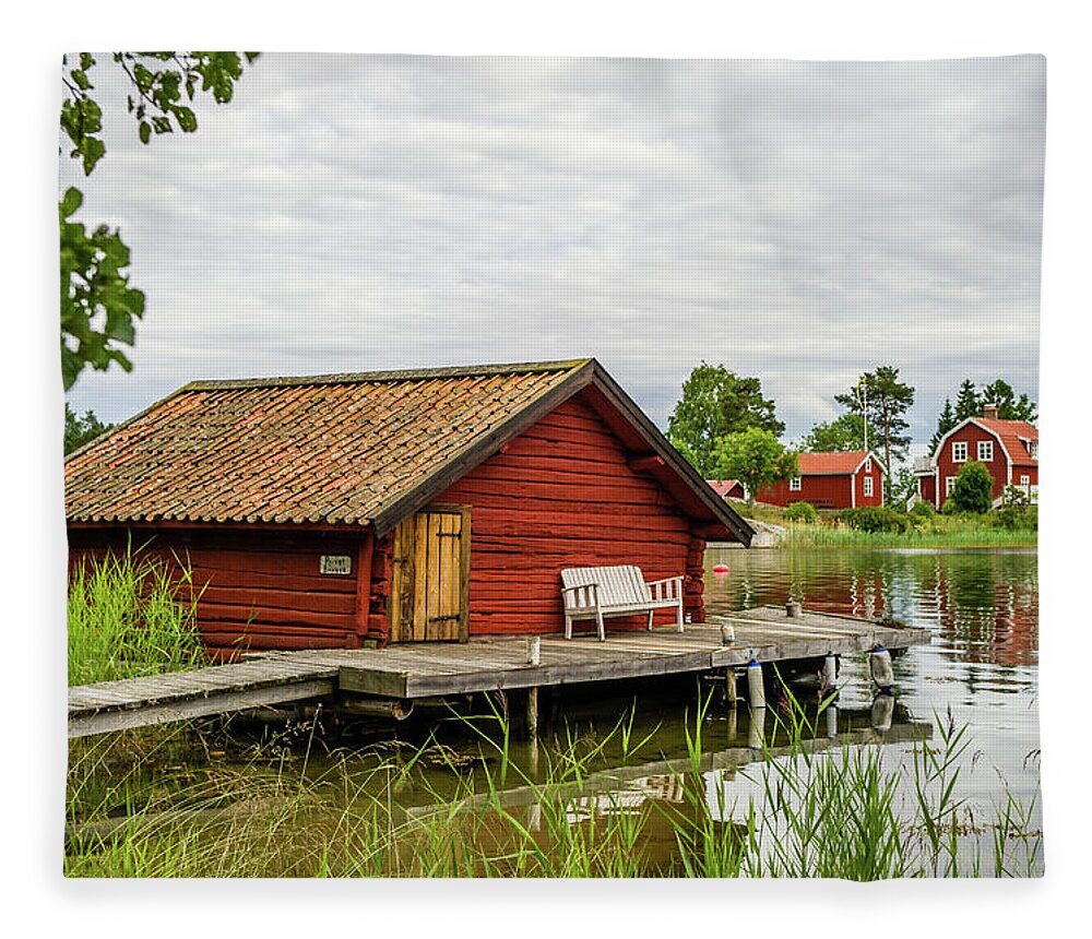 The Old Boathouse Fleece Blanket featuring the photograph Old boathouse by Torbjorn Swenelius