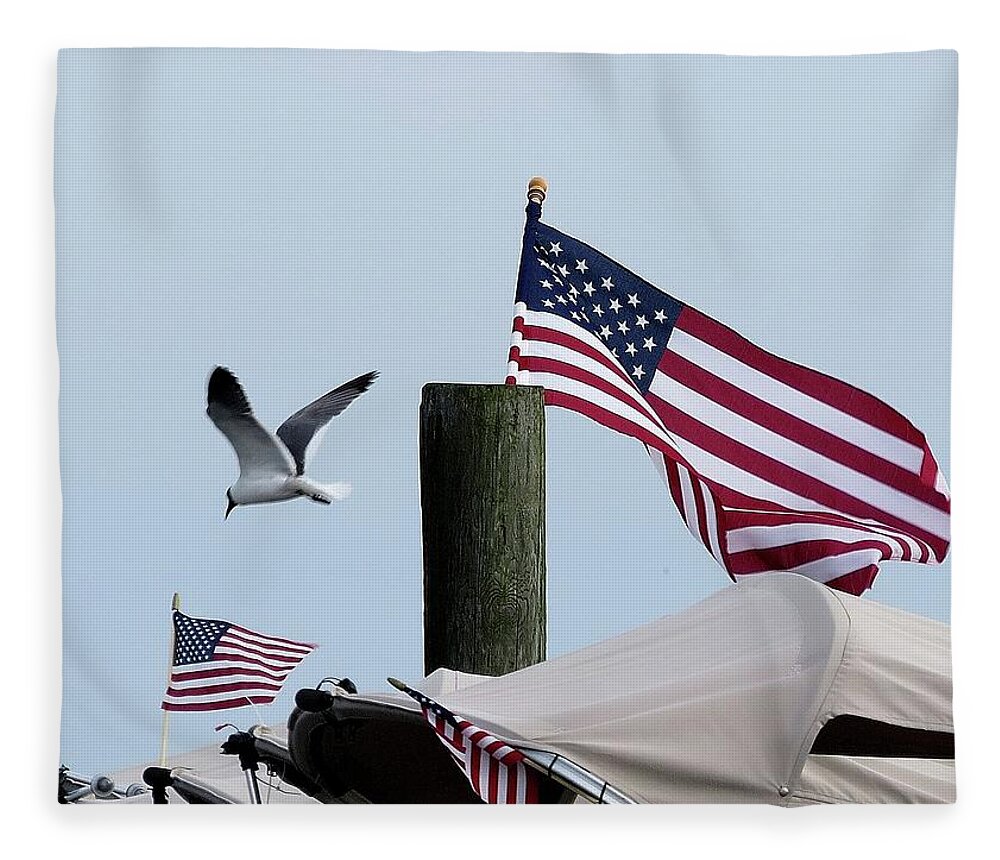 American Flag Fleece Blanket featuring the photograph Old Glory and Gull by Linda Stern