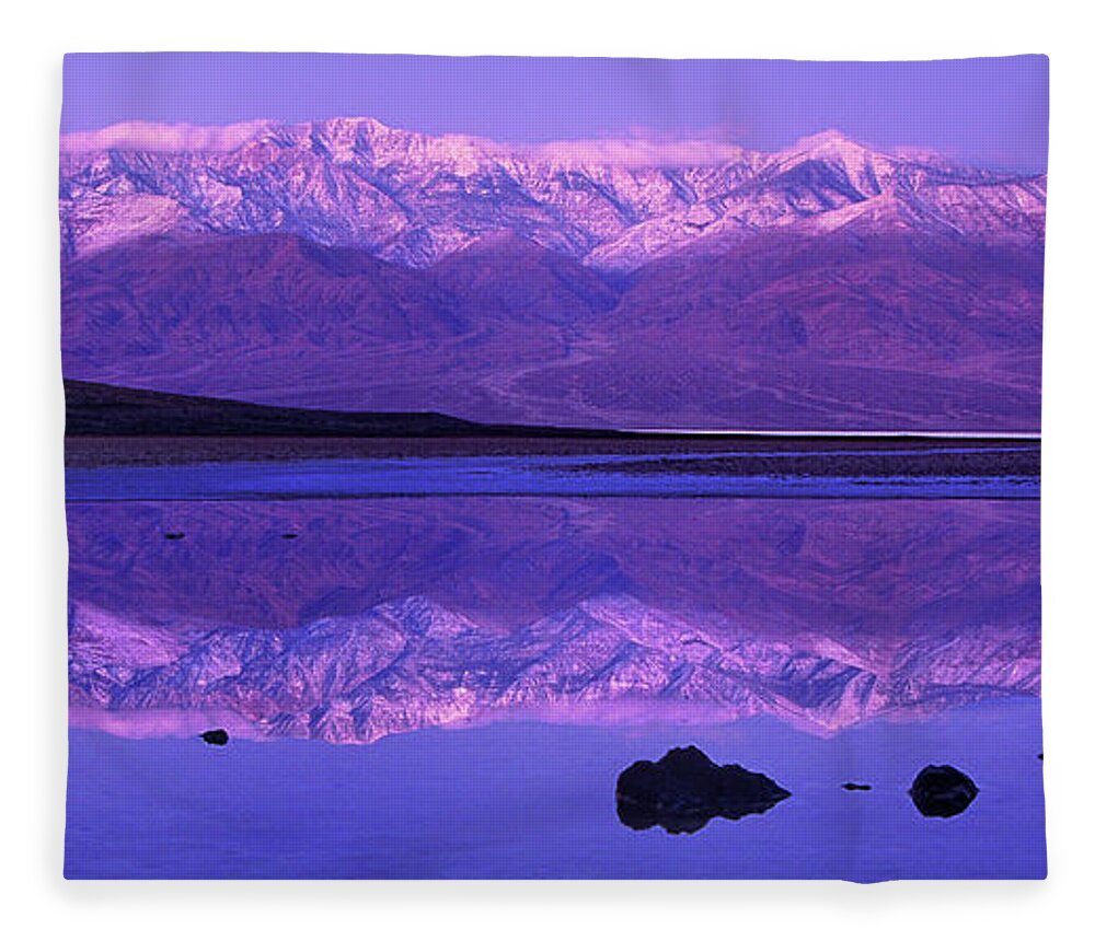 North America Fleece Blanket featuring the photograph Panorama Badwater and the Panamint Range at Sunrise Death Valley by Dave Welling