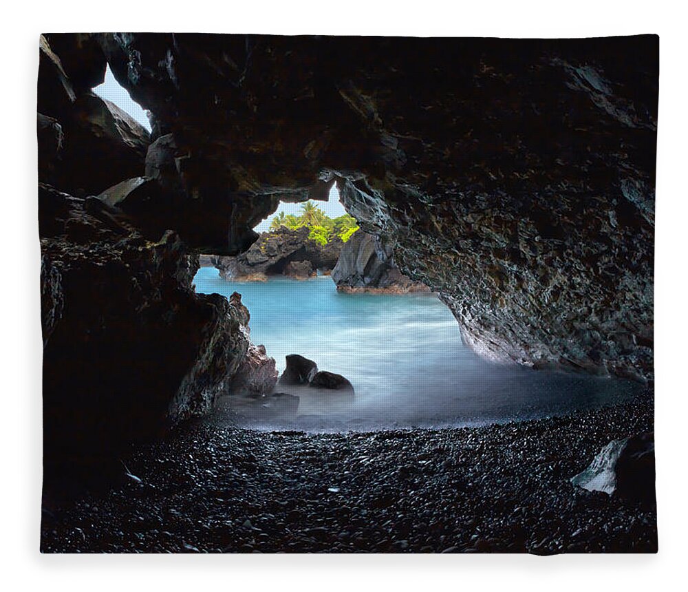 Hana Fleece Blanket featuring the photograph Peeking Through the Lava Tube by Susan Rissi Tregoning