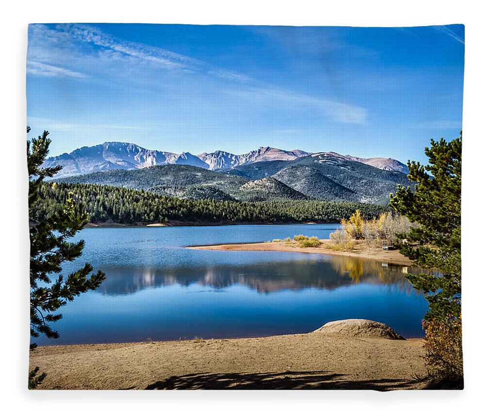 Blue Sky Fleece Blanket featuring the photograph Pikes Peak Over Crystal Lake by Ron Pate