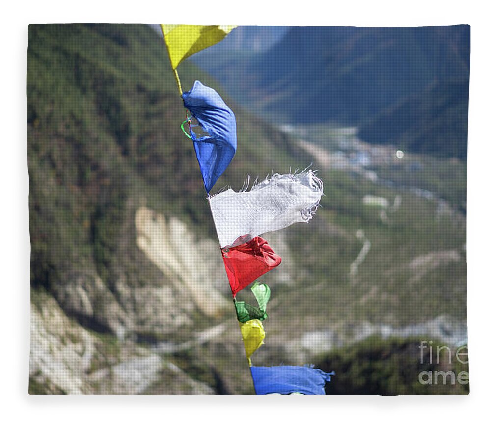 Nepal Fleece Blanket featuring the photograph Prayer flags in the Himalaya mountains, Annapurna region, Nepal by Raimond Klavins