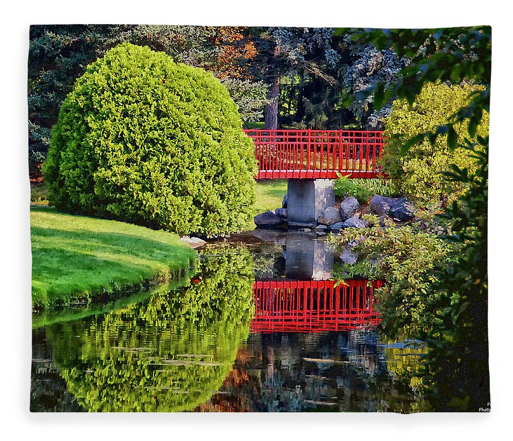 Red Bridge Fleece Blanket featuring the photograph Red Bridge at Dow Gardens by Peg Runyan