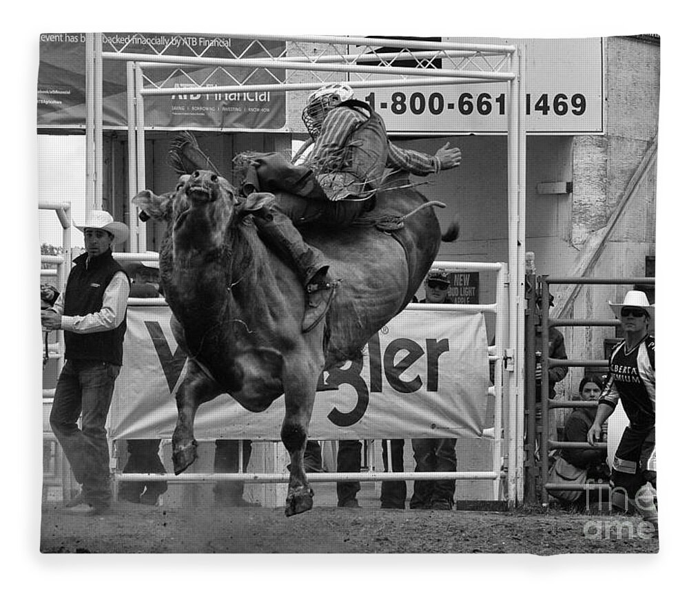 Bull Fleece Blanket featuring the photograph Rodeo Bull Riding 1 by Bob Christopher