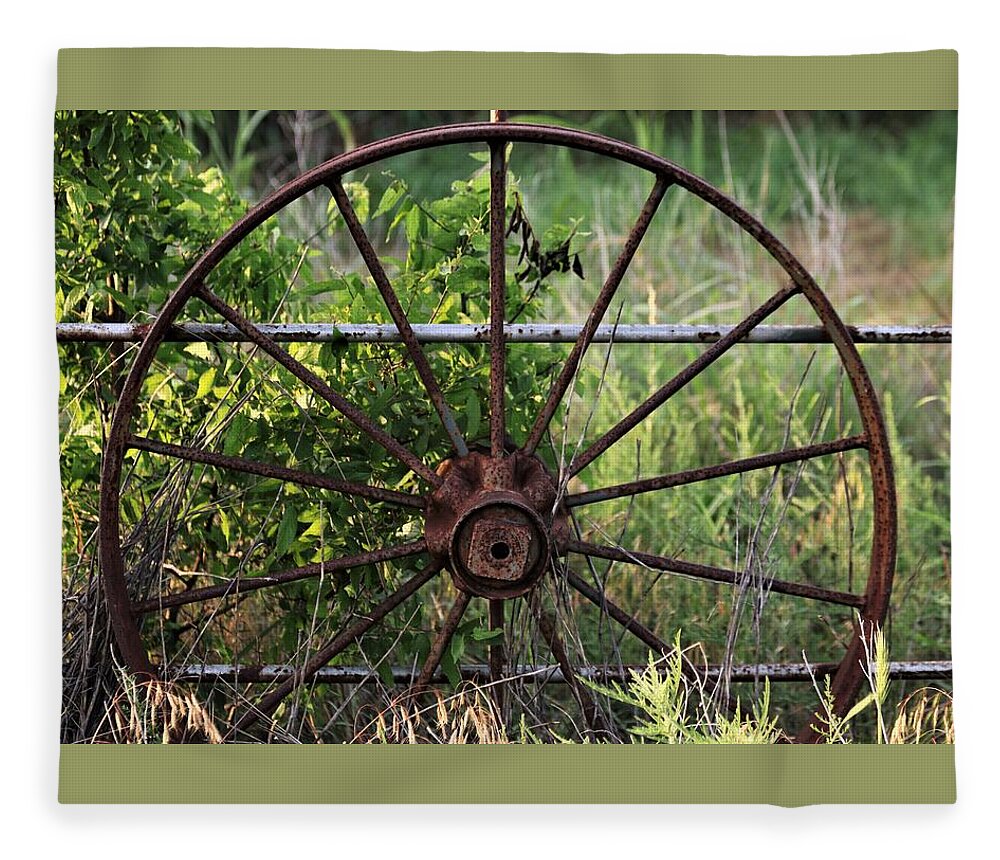 Objects Fleece Blanket featuring the photograph Rusty Wagon Wheel on Fence by Sheila Brown