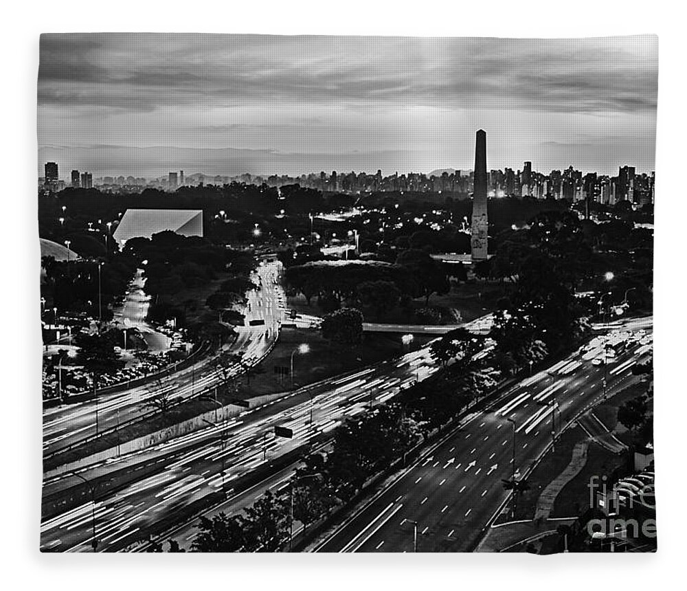 Skyline Fleece Blanket featuring the photograph Sao Paulo Skyline - Ibirapuera and Obelisk - Black and White by Carlos Alkmin
