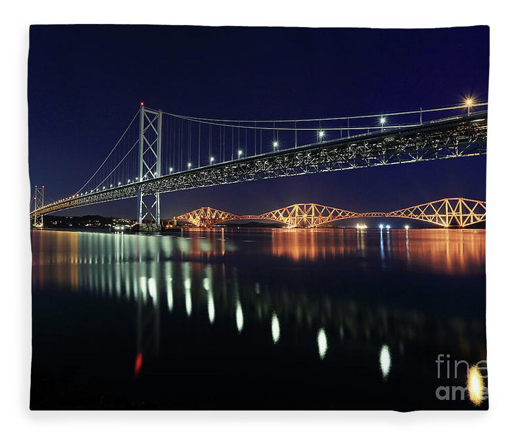 Forth Bridge Fleece Blanket featuring the photograph Scottish Steel in Silver and Gold lights across the Firth of Forth at Night by Maria Gaellman