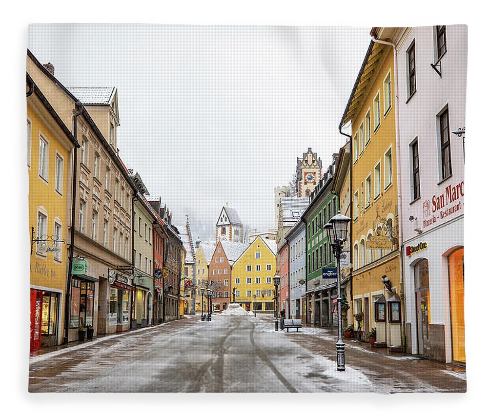 Photosbymch Fleece Blanket featuring the photograph Snowy street in Fussen by M C Hood