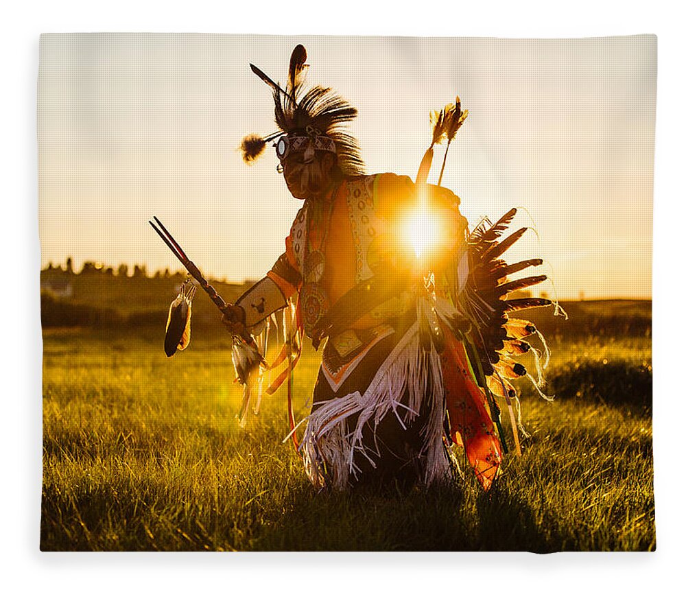 A Traditional Native American Indian Dances At Sunset At A Powwow In Montana. Fleece Blanket featuring the photograph Sun Dance by Todd Klassy