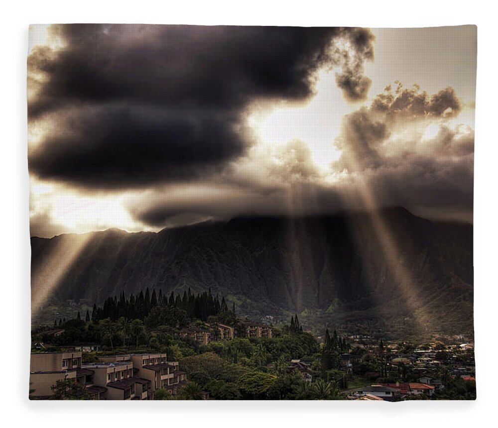Hawaii Fleece Blanket featuring the photograph Sunlight breaking through the gloom by Dan McManus