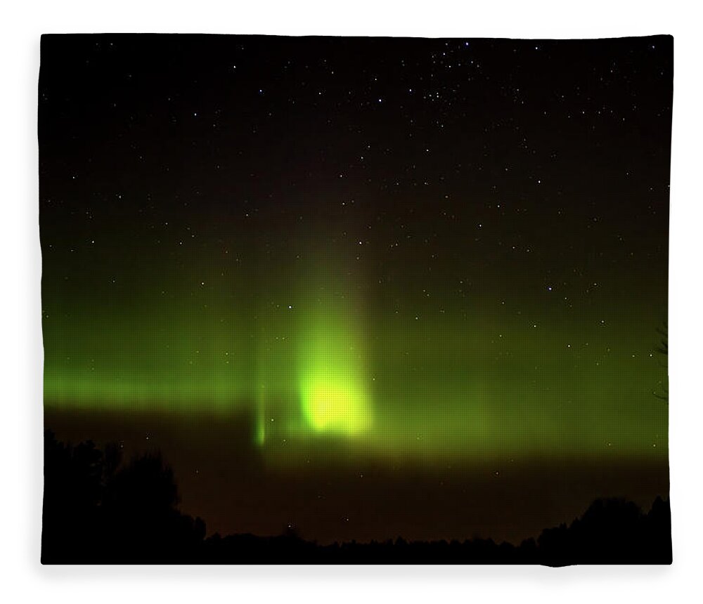 Aurora Borealis Fleece Blanket featuring the photograph The Northern Lights Peaks Aurora Borealis by Torbjorn Swenelius