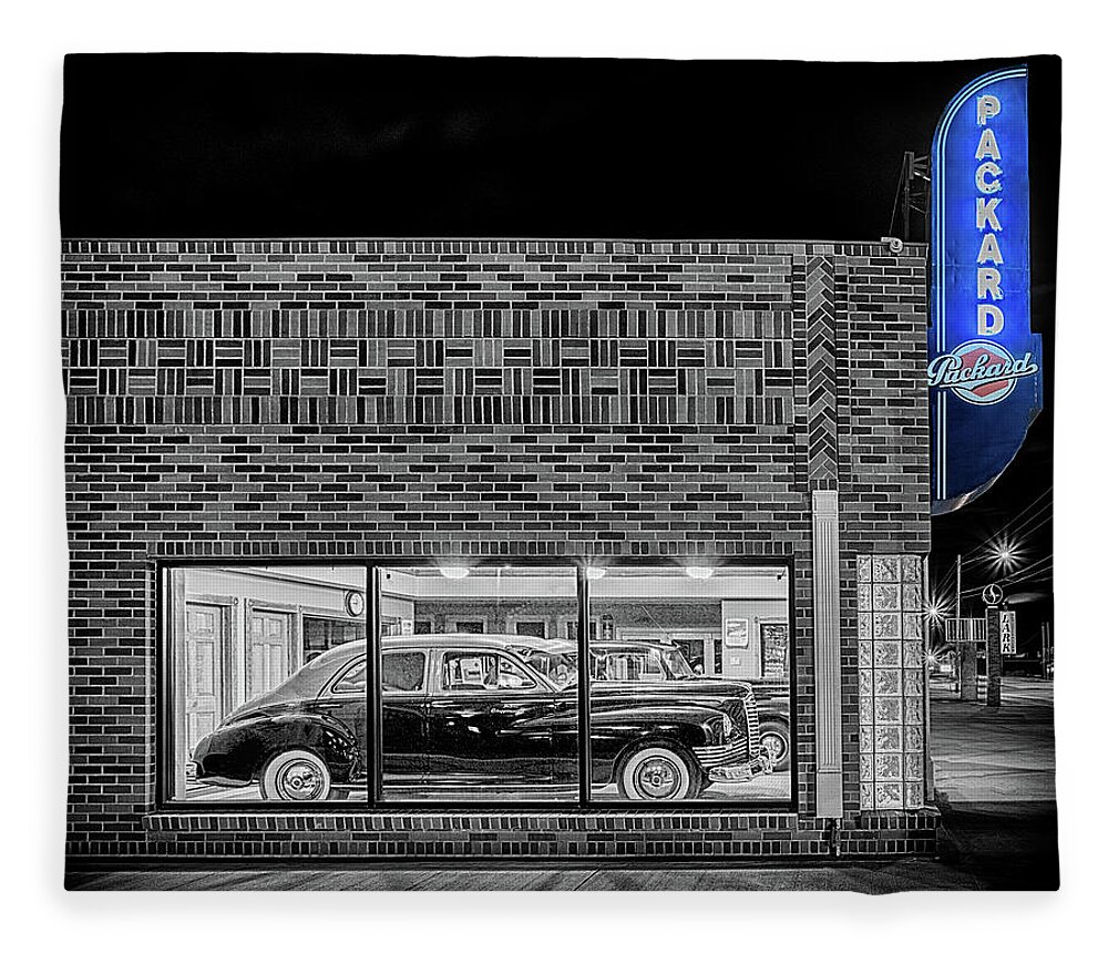 Packard Fleece Blanket featuring the photograph The Old Packard Dealership #2 by Susan Rissi Tregoning