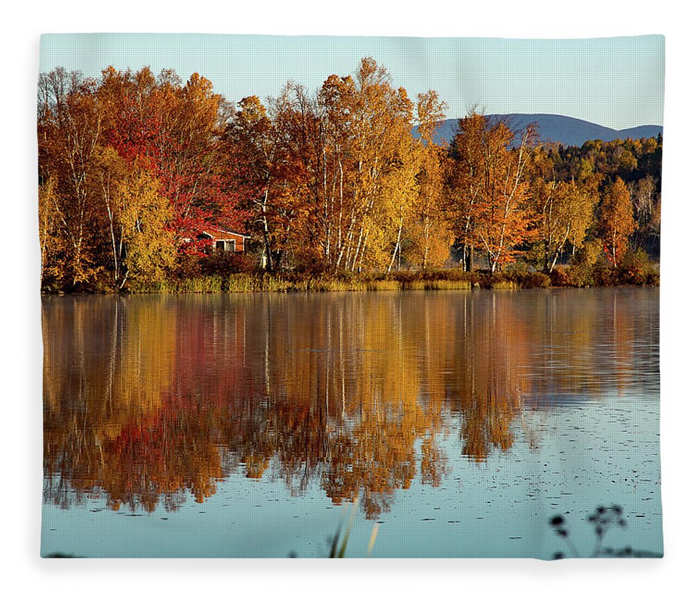 Haley Pond Fleece Blanket featuring the photograph The point of Maine fall colors by Jeff Folger