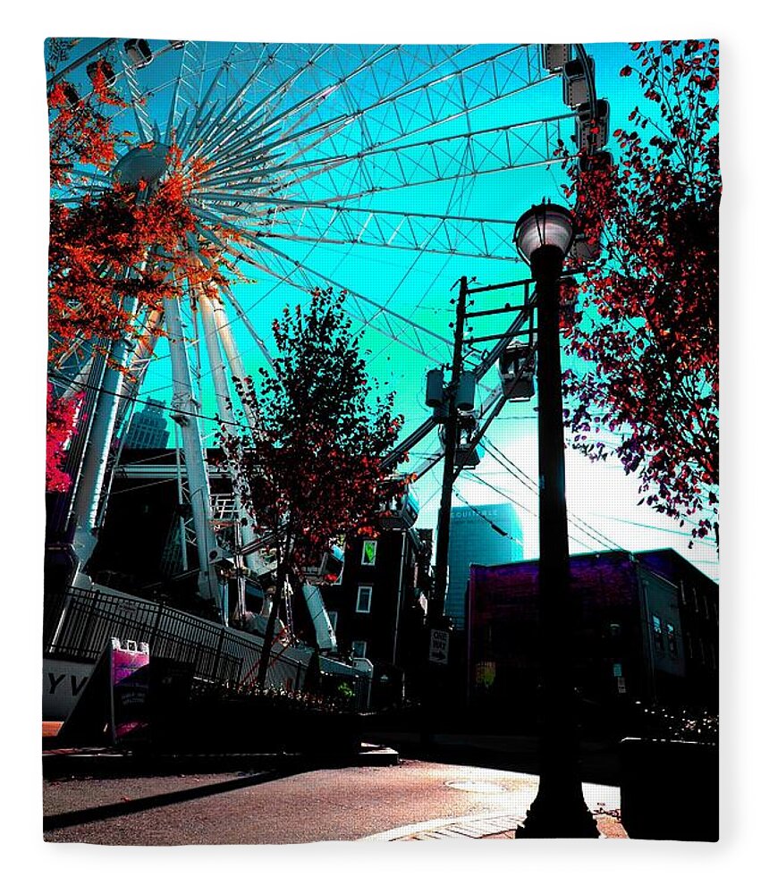 Atlanta Fleece Blanket featuring the photograph The Wheel Blue by D Justin Johns