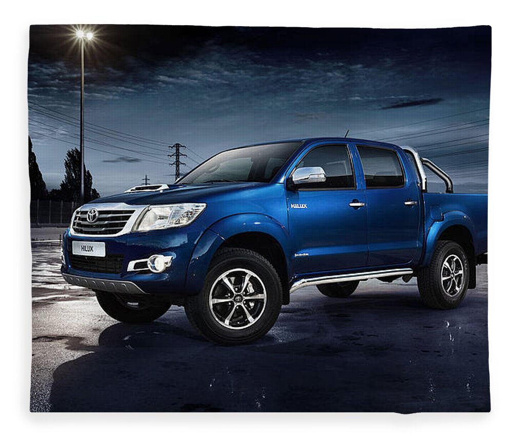 Toyota Hilux Fleece Blanket featuring the photograph Toyota Hilux by Mariel Mcmeeking