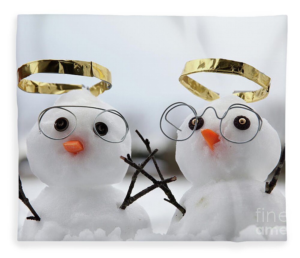 Snowmen Fleece Blanket featuring the photograph Two cute snowman angles with golden halos by Simon Bratt