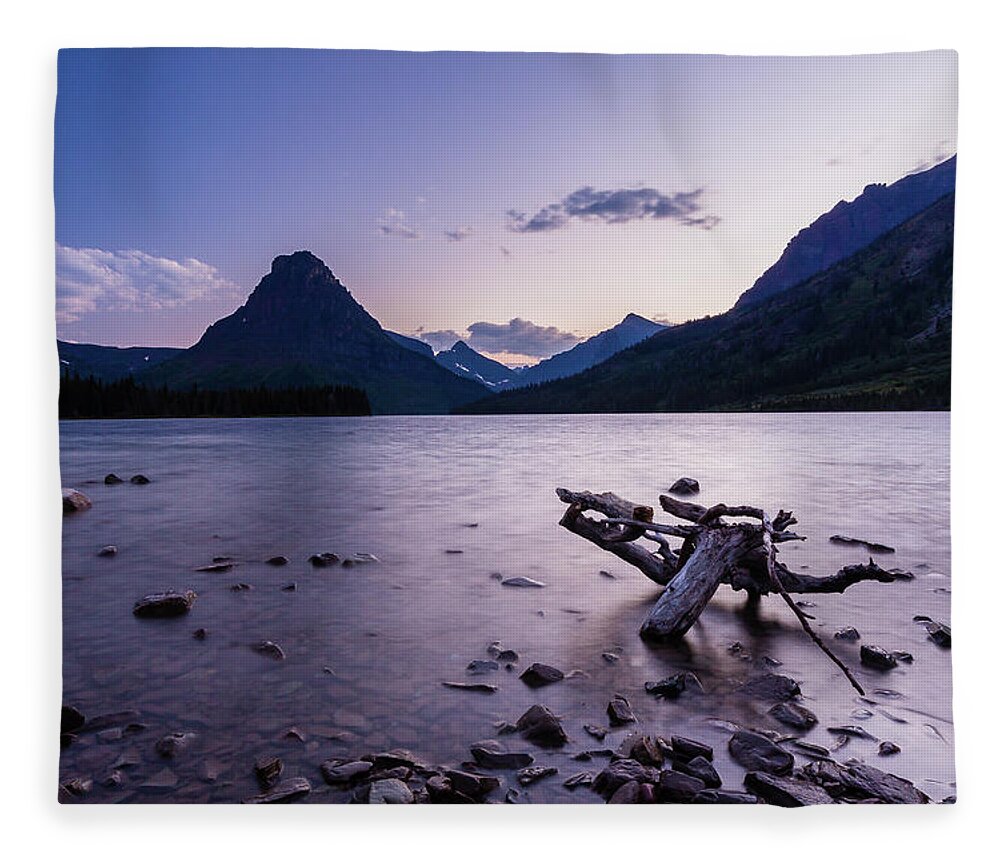 Clements Mountain Fleece Blanket featuring the photograph two medicine lake, MT 2 by Mati Krimerman